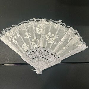 22 plastic white fans never opened